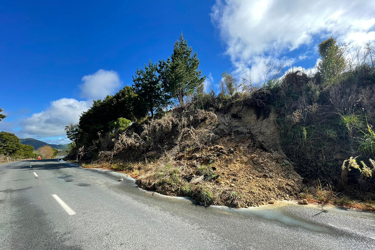Slip partially covering road